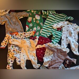 Assorted holiday footies and onesies